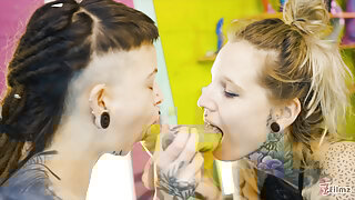 Alternative girls enjoy a strap on fuck fest