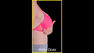 Wifey in a hot pink lingerie bra