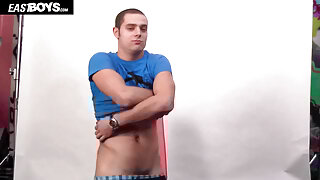 Muscle boy shows off his muscles by EastBoys
