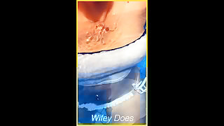 Wifey swims in the pool with her white shirt